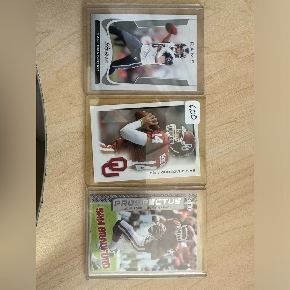 Sam Bradford football cards in great condition. (3)